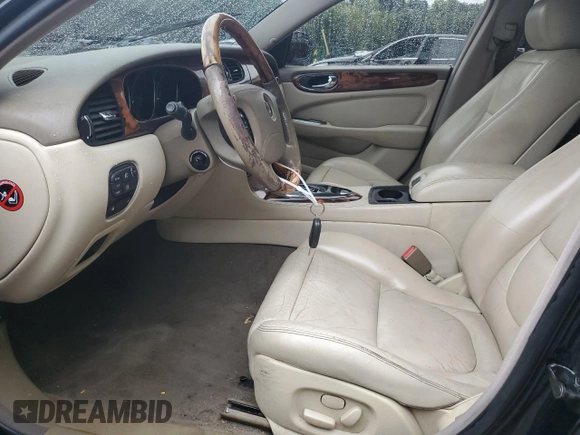 2004 Jaguar XJ with VIN SAJWA71C24SG33915, listed as a Copart auction lot 69626864 with 123,746 mi miles and Non Repairable. Bid and sale history available at carsss.com. Image 7.