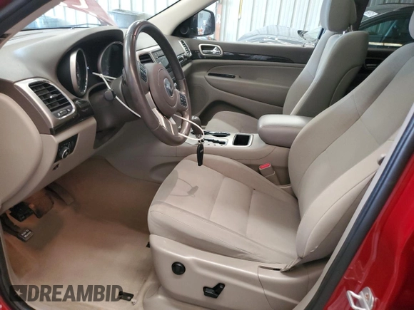 2011 Jeep Grand Cherokee Laredo with VIN 1J4RR4GG3BC669561, listed as a Copart auction lot 63627395 with 99,211 mi miles and Salvage title. Bid and sale history available at DreamBid. Image 7.