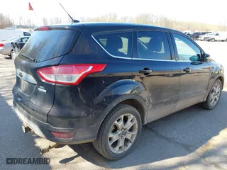 2013 Ford Escape SEL with VIN 1FMCU0H9XDUC42566, listed as a IAAI auction lot 42087717 with 233,091 mi miles. Bid and sale history available at carsss.com. Image 4.