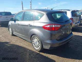2013 Ford C-Max Hybrid SE with VIN 1FADP5AU6DL544072, listed as a IAAI auction lot 41798270 with 203,489 mi miles. Bid and sale history available at carsss.com. Image 3.