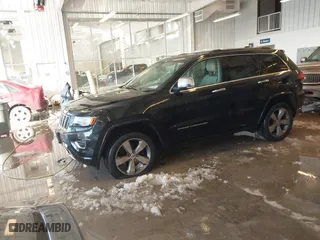 2014 Jeep Grand Cherokee Overland with VIN 1C4RJFCT7EC187319, listed as a IAAI auction lot 41256107 with 98,287 mi miles. Bid and sale history available at carsss.com. Image 18.
