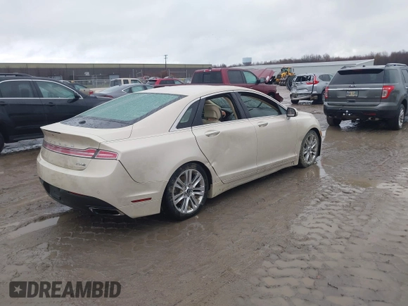 2015 Lincoln MKZ z VIN 3LN6L2J96FR618325, wystawiony jako IAAI lot #41046851 z przebiegiem Nie podano mil oraz . Historia ofert i sprzedaży dostępna na DreamBid. Obrazek 4.