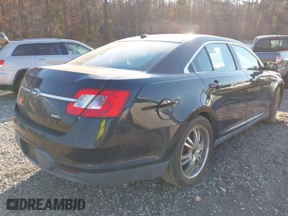 2011 Ford Taurus SEL with VIN 1FAHP2EW3BG111083, listed as a IAAI auction lot 41378232 with 278,577 mi miles. Bid and sale history available at carsss.com. Image 4.