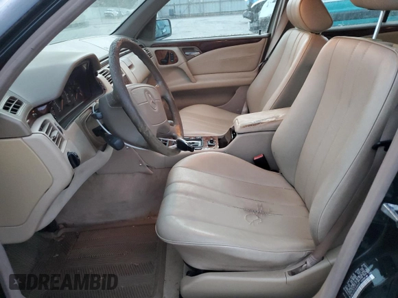 1998 Mercedes-Benz E 320 with VIN WDBJF25F0WA684027, listed as a Copart auction lot 82171114 with 259,427 mi miles and Salvage Title. Bid and sale history available at DreamBid. Image 7.