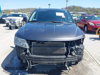 2014 Dodge Journey SE with VIN 3C4PDCAB7ET136799, listed as a IAAI auction lot 41972348 with 163,357 mi miles. Bid and sale history available at carsss.com. Image 13.