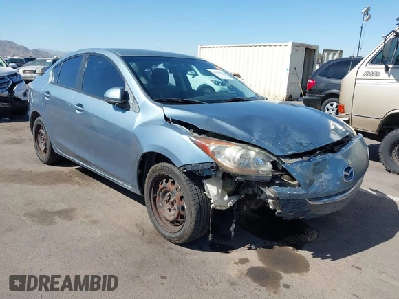 2010 Mazda Mazda3 i Touring with VIN JM1BL1SG5A1164355, listed as a IAAI auction lot 42044865 with 127,809 mi miles. Bid and sale history available at carsss.com. Image 1.