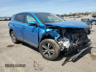 2018 Toyota RAV4 XLE with VIN 2T3WFREV8JW407501, listed as a Copart auction lot 54239815 with Not Provided miles and Salvage Title. Bid and sale history available at DreamBid. Image 4.