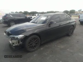 2013 BMW 3 Series 328i with VIN WBA3A5G55DNP26709, listed as a IAAI auction lot 37057796 with 103,168 mi miles and . Bid and sale history available at DreamBid. Image 2.