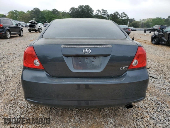 2007 Scion tC Spec z VIN JTKDE167570179636, wystawiony jako Copart lot #51235535 z przebiegiem 184 645 mil mil oraz Szkoda całkowita • Salvage title. Historia ofert i sprzedaży dostępna na DreamBid. Obrazek 6.
