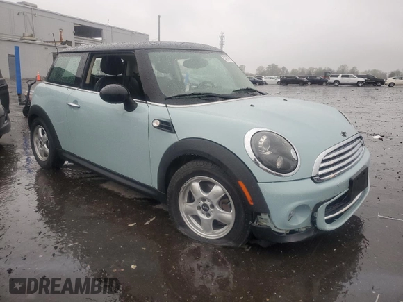 2011 MINI Hardtop with VIN WMWSU3C57BT096973, listed as a Copart auction lot 52726185 with 90,545 mi miles and Salvage title. Bid and sale history available at DreamBid. Image 4.