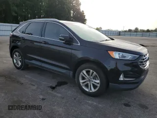 2020 Ford Edge SEL с VIN 2FMPK3J94LBA92154, выставлен на аукционе Copart как лот 65060385 с пробегом 150 187 миль миль и Чистый • Clean title. История ставок и продаж доступна на DreamBid. Изображение 4.