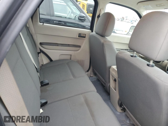 2009 Ford Escape XLS z VIN 1FMCU92759KB19563, wystawiony jako Copart lot #86012594 z przebiegiem 98 615 mil mil oraz Czysty tytuł • Clean title. Historia ofert i sprzedaży dostępna na DreamBid. Obrazek 10.