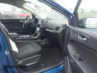 2024 Ford Edge SE z VIN 2FMPK4G93RBA72662, wystawiony jako IAAI lot #42097425 z przebiegiem 7 234 mil mil oraz . Historia ofert i sprzedaży dostępna na DreamBid. Obrazek 5.