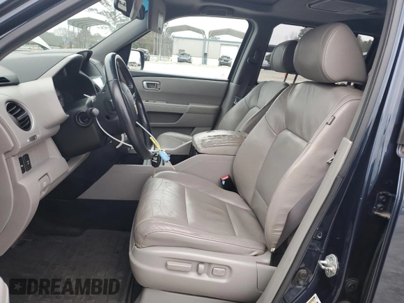 2011 Honda Pilot Touring with VIN 5FNYF4H96BB077391, listed as a Copart auction lot 41520315 with 196,291 mi miles and Salvage Title. Bid and sale history available at DreamBid. Image 7.