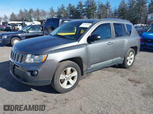 2011 Jeep Compass Latitude with VIN 1J4NF1FB4BD282703, listed as a IAAI auction lot 41753104 with 139,999 mi miles. Bid and sale history available at carsss.com. Image 2.