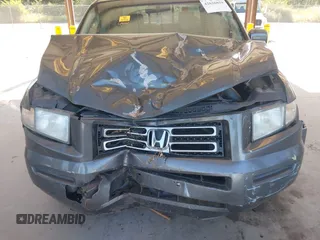 2007 Honda Ridgeline RTL with VIN 2HJYK16537H529904, listed as a IAAI auction lot 42626859 with 294,953 mi miles and . Bid and sale history available at DreamBid. Image 6.
