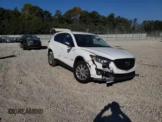 2016 Mazda CX-5 Touring with VIN JM3KE2CY6G0896040, listed as a Copart auction lot 78399684 with 98,639 mi miles and Salvage Title. Bid and sale history available at DreamBid. Image 12.