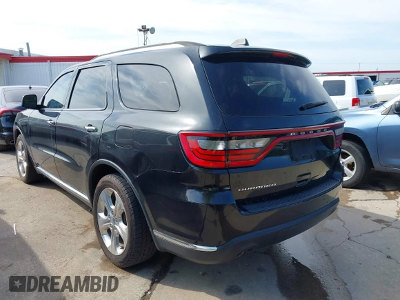 2015 Dodge Durango SXT with VIN 1C4RDHAG3FC127841, listed as a IAAI auction lot 42693953 with 214,854 mi miles and . Bid and sale history available at DreamBid. Image 3.