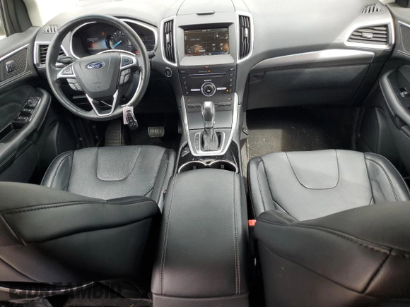 2015 Ford Edge Titanium z VIN 2FMTK4K84FBB09582, wystawiony jako Copart lot #55801915 z przebiegiem 72 533 mil mil oraz Szkoda całkowita • Salvage title. Historia ofert i sprzedaży dostępna na DreamBid. Obrazek 8.