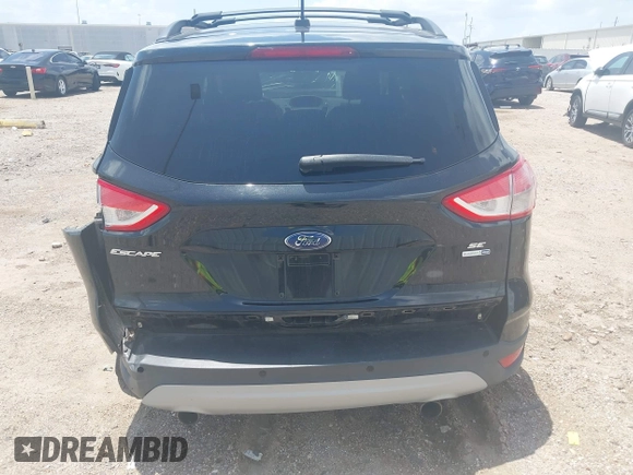 2013 Ford Escape SE with VIN 1FMCU9GX0DUC42483, listed as a IAAI auction lot 42549857 with 138,028 mi miles and . Bid and sale history available at DreamBid. Image 16.