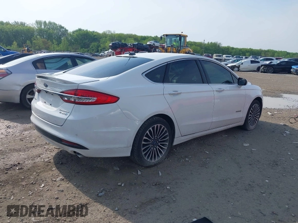 2018 Ford Fusion Titanium with VIN 3FA6P0RU2JR246812, listed as a IAAI auction lot 42157030 with 168,680 mi miles and . Bid and sale history available at DreamBid. Image 4.
