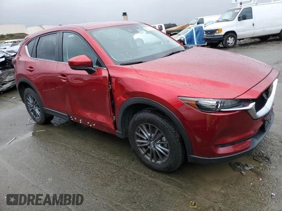 2021 Mazda CX-5 Touring with VIN JM3KFACM8M0406987, listed as a Copart auction lot 45241535 with 57,673 mi miles and Salvage Title. Bid and sale history available at carsss.com. Image 4.