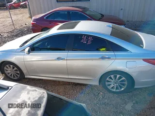 2014 Hyundai Sonata SE with VIN 5NPEC4AC0EH848726, listed as a IAAI auction lot 41747200 with 121,720 mi miles and . Bid and sale history available at DreamBid. Image 14.