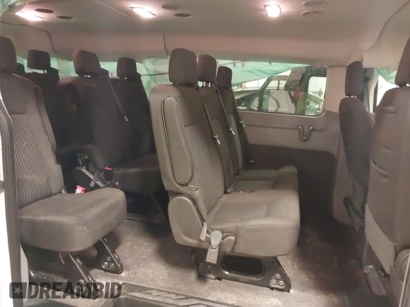 2019 Ford Transit Passenger XL with VIN 1FBZX2YM7KKA22871, listed as a IAAI auction lot 41721561 with 112,189 mi miles. Bid and sale history available at carsss.com. Image 8.