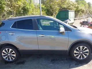 2019 Buick Encore Essence with VIN KL4CJGSM5KB869925, listed as a IAAI auction lot 41937487 with 105,702 mi miles. Bid and sale history available at carsss.com. Image 14.