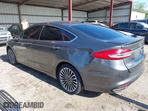 2017 Ford Fusion Titanium with VIN 3FA6P0K98HR124035, listed as a IAAI auction lot 42307936 with Not provided miles and . Bid and sale history available at DreamBid. Image 3.