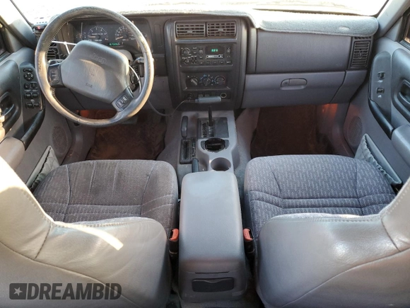 1997 Jeep Cherokee Sport z VIN 1J4FJ68S9VL594832, wystawiony jako Copart lot #53081675 z przebiegiem 167 028 mil mil oraz Czysty tytuł • Clean title. Historia ofert i sprzedaży dostępna na DreamBid. Obrazek 8.