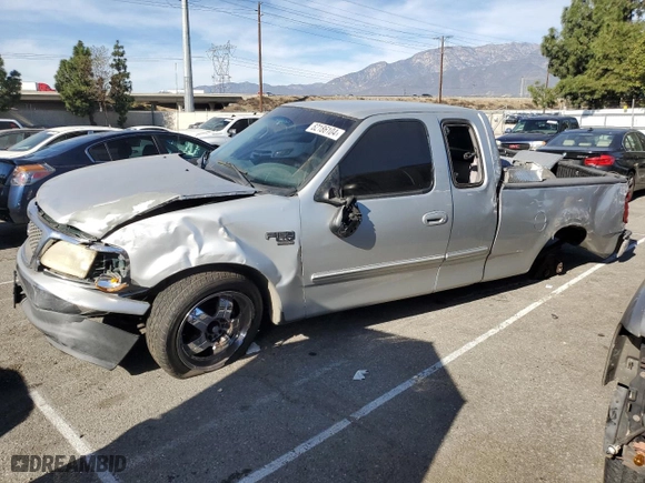 1999 Ford F-150 Work Series with VIN 1FTRX17W1XKB96094, listed as a Copart auction lot 82186104 with NaN miles and Salvage Title. Bid and sale history available at carsss.com. Image 1.