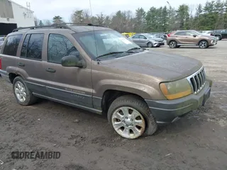 2001 Jeep Grand Cherokee Laredo z VIN 1J4GW48SX1C658610, wystawiony jako IAAI lot #41831013 z przebiegiem 200 142 mil mil oraz . Historia ofert i sprzedaży dostępna na DreamBid. Obrazek 1.