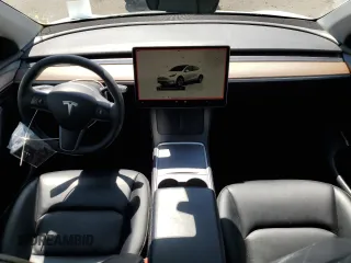 2022 Tesla Model Y Long Range with VIN 7SAYGAEE4NF534588, listed as a Copart auction lot 53274995 with 20,768 mi miles and Salvage Title. Bid and sale history available at DreamBid. Image 8.