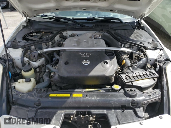 2006 Nissan 350Z Touring z VIN JN1AZ36A56M450937, wystawiony jako Copart lot #56544955 z przebiegiem 102 027 mil mil oraz Szkoda całkowita • Salvage title. Historia ofert i sprzedaży dostępna na DreamBid. Obrazek 11.