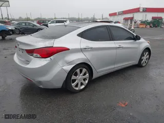 2013 Hyundai Elantra GLS PZEV with VIN KMHDH4AE9DU499015, listed as a IAAI auction lot 41938352 with 243,771 mi miles. Bid and sale history available at carsss.com. Image 4.
