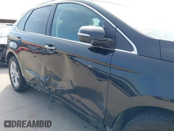 2015 Ford Edge Titanium z VIN 2FMTK3K87FBC06852, wystawiony jako IAAI lot #42335238 z przebiegiem 187 256 mil mil oraz . Historia ofert i sprzedaży dostępna na DreamBid. Obrazek 6.