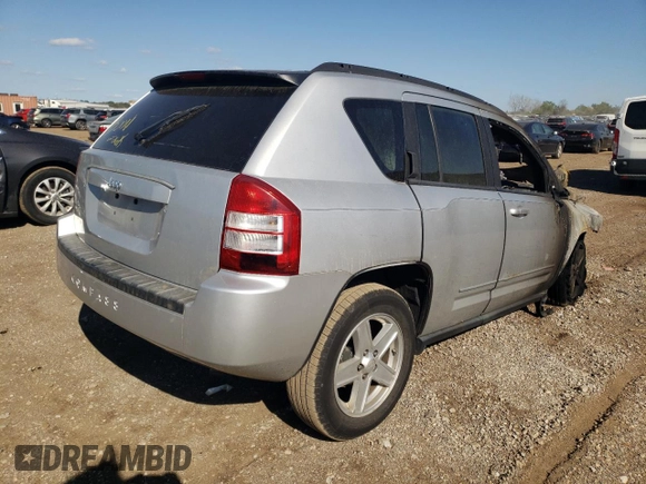 2010 Jeep Compass Sport with VIN 1J4NF4FB1AD672772, listed as a Copart auction lot 74220304 with 0 mi miles and Salvage Title. Bid and sale history available at carsss.com. Image 3.