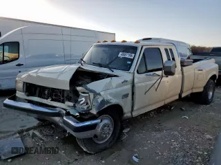 1990 Ford F-350 with VIN 1FTJX35G9LKB37812, listed as a Copart auction lot 48407195 with 5,999 mi miles and Salvage title. Bid and sale history available at DreamBid. Image 1.