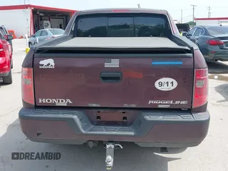 2009 Honda Ridgeline RT with VIN 5FPYK16239B109716, listed as a IAAI auction lot 42068772 with 206,649 mi miles. Bid and sale history available at carsss.com. Image 16.