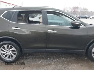 2015 Nissan Rogue SL with VIN 5N1AT2MVXFC911260, listed as a IAAI auction lot 41823690 with 128,121 mi miles. Bid and sale history available at carsss.com. Image 12.