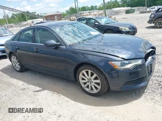 2013 Audi A6 Premium Plus z VIN WAUGFAFC9DN140252, wystawiony jako IAAI lot #42217350 z przebiegiem 126 970 mil mil oraz . Historia ofert i sprzedaży dostępna na DreamBid. Obrazek 1.