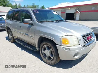 2004 GMC Envoy SLE with VIN 1GKDT13S942289566, listed as a IAAI auction lot 42786134 with 173,544 mi miles and . Bid and sale history available at DreamBid. Image 1.
