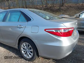 2016 Toyota Camry XLE with VIN 4T4BF1FK5GR582980, listed as a IAAI auction lot 42145802 with 85,702 mi miles and . Bid and sale history available at DreamBid. Image 12.