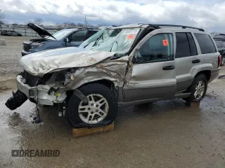 2003 Jeep Grand Cherokee Laredo z VIN 1J4GW48S13C562402, wystawiony jako Copart lot #49691115 z przebiegiem 293 802 mil mil oraz Nie do naprawy • Non repairable. Historia ofert i sprzedaży dostępna na DreamBid. Obrazek 1.