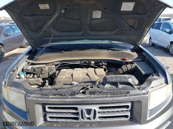2007 Honda Ridgeline RTL w/Leather with VIN 2HJYK16547H526249, listed as a IAAI auction lot 41769625 with 173,168 mi miles. Bid and sale history available at carsss.com. Image 10.
