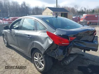 2018 Ford Focus SE with VIN 1FADP3F25JL306401, listed as a IAAI auction lot 41914390 with 84,106 mi miles. Bid and sale history available at carsss.com. Image 3.