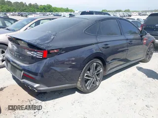 2025 Hyundai Sonata N Line z VIN KMHL54JC0SA430778, wystawiony jako IAAI lot #42082731 z przebiegiem 6 769 mil mil oraz . Historia ofert i sprzedaży dostępna na DreamBid. Obrazek 4.