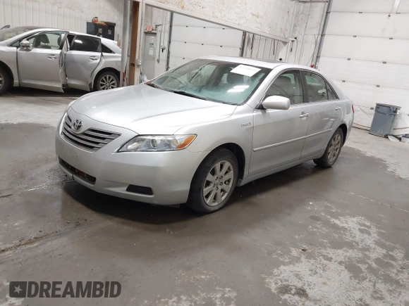 2007 Toyota Camry z VIN JTNBB46KX73018805, wystawiony jako IAAI lot #42210872 z przebiegiem 138 975 mil mil oraz . Historia ofert i sprzedaży dostępna na DreamBid. Obrazek 2.