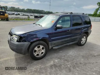 2003 Ford Escape XLT Popular with VIN 1FMCU03123KA03878, listed as a Copart auction lot 60133485 with 298,100 mi miles and Salvage title. Bid and sale history available at DreamBid. Image 1.